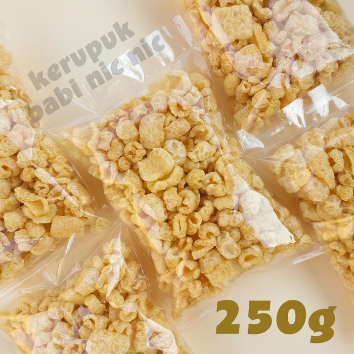 

Terlaris- Kerupuk Kulit Babi Nic Nic 250 Gram Snack Cemilan Kerubi