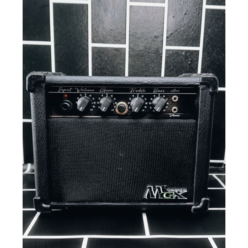 Ampli gitar MGX Distorsi/Aux/headphone (bisa mic) - free kabel Aux