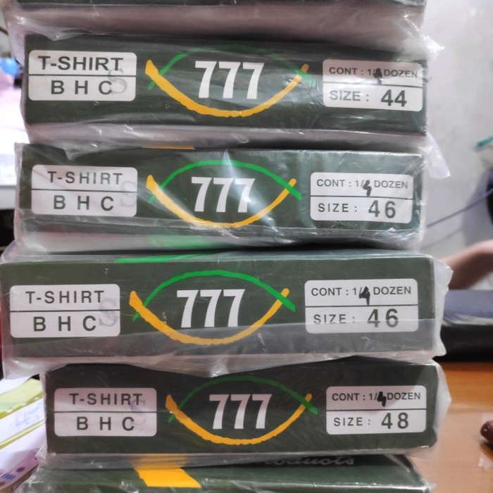 TERLARIS Kaos Dalam / oblong 777 kancing 44-46-48