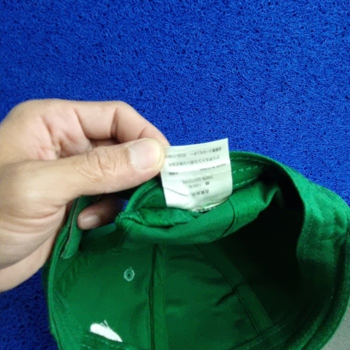 topi golf bridgestone hijau tebal