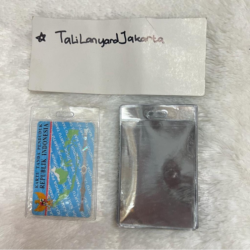 

Kantong KTP Bening Ukuran 6x9 ISI 100 , Plastik Mika Micron 0,19 Model Segi ada lubang buat gantung