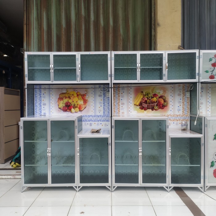 lemari rak piring kaca 3 pintu