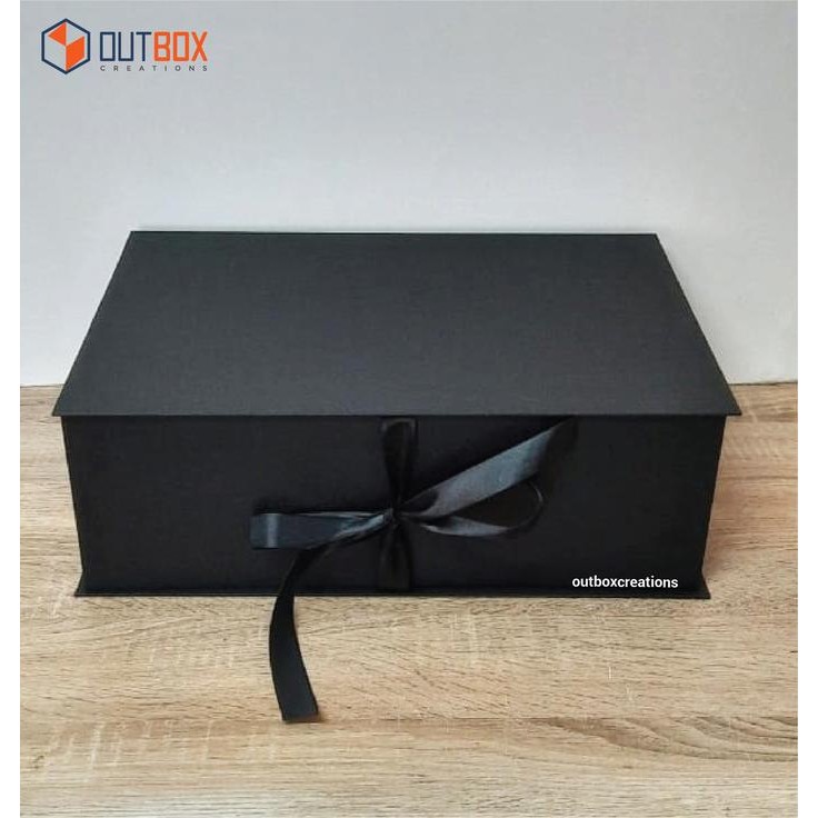 

Pesta- Box Kado Pita Hitam Besar