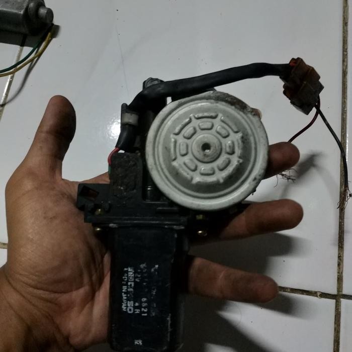 MOTOR DINAMO POWER WINDOW SUZUKI BALENO LAMA KANAN DEPAN ORI ORIGINAL