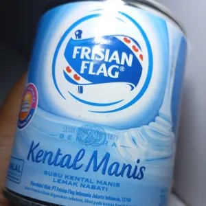 Susu putih bendera kaleng