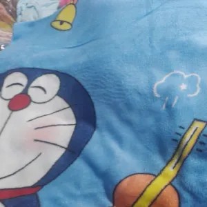 selimut karakter doraemon