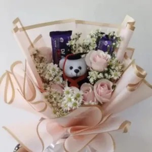 66.bucket wisuda 2 coklat dairy milk plus bunga mawar segar pink 5 tangkai