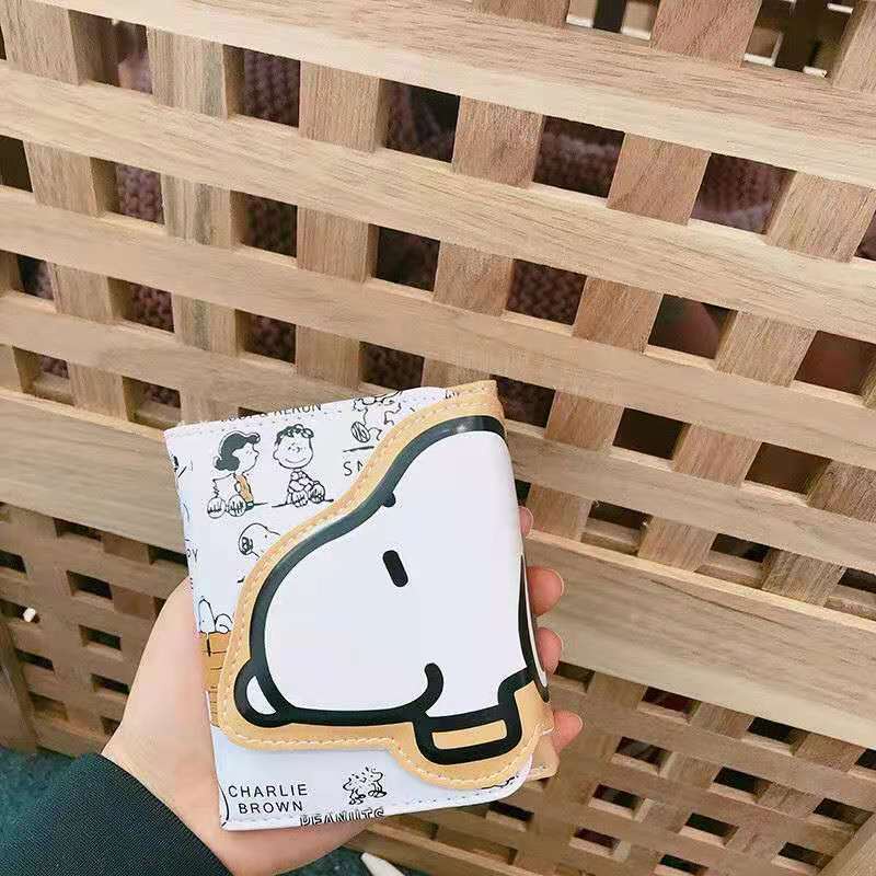 Dompet Sera Snoopy hadiah ulang tahun wanita 2021 baru asli dalam dompet pendek wanita siswa kartun Jepang dan Korea