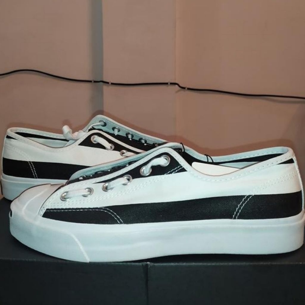 Sepatu Converse x the soloist jack purcell low top