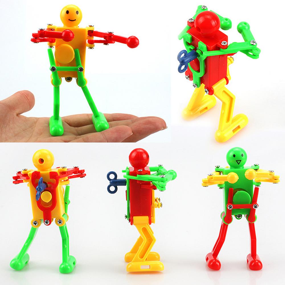 Mainan Robot Wind Up Klasik Bahan Plastik Model Jarum Jam Musim Semi Wind-Up Dancing Robots Toy Untuk Anakanakanak Laki-Laki