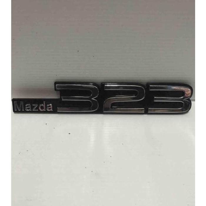 Logo/emblem mazda 323