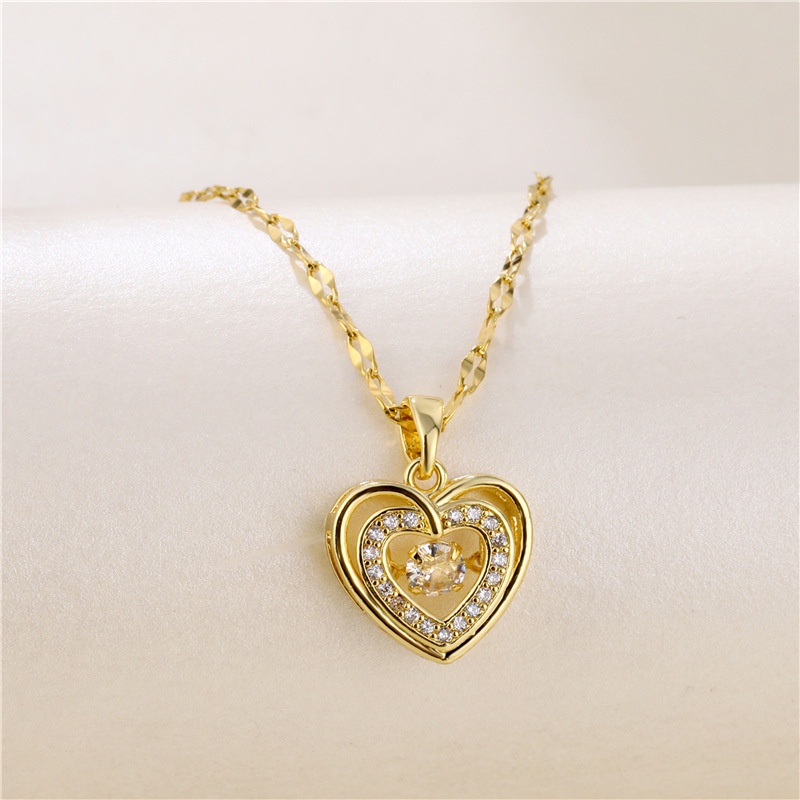 Kalung Bahan Titanium Steel Anti Karat Hypoallergenic Desain Hati Ganda Aksen Berlian Untuk Wanita