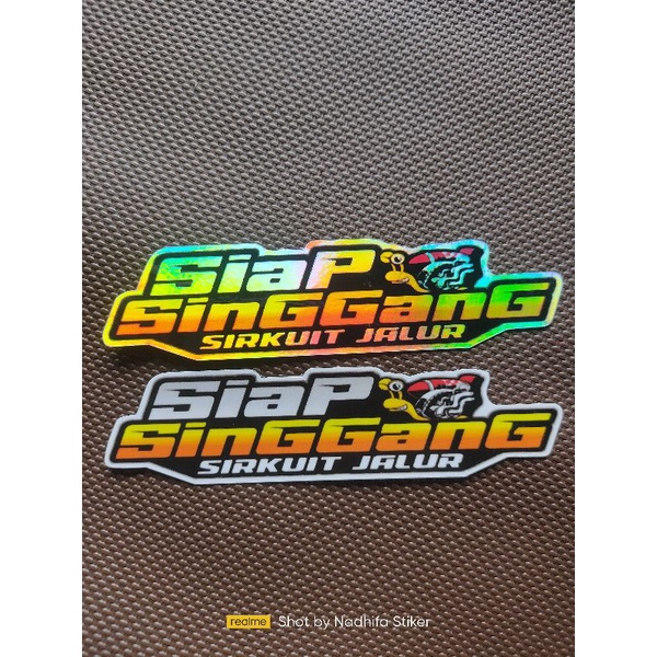 

Stiker HOLOGRAM tulisan "Siap Singgang