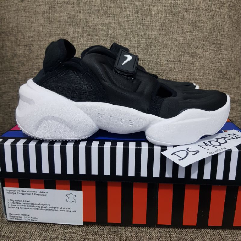 nike aqua rift black white 100% original
CW 7164-001
