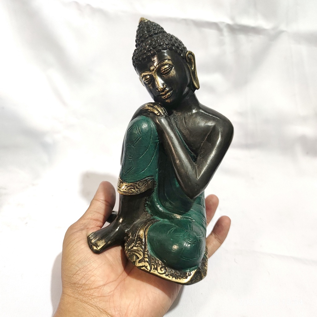 patung buddha logam kuningan
