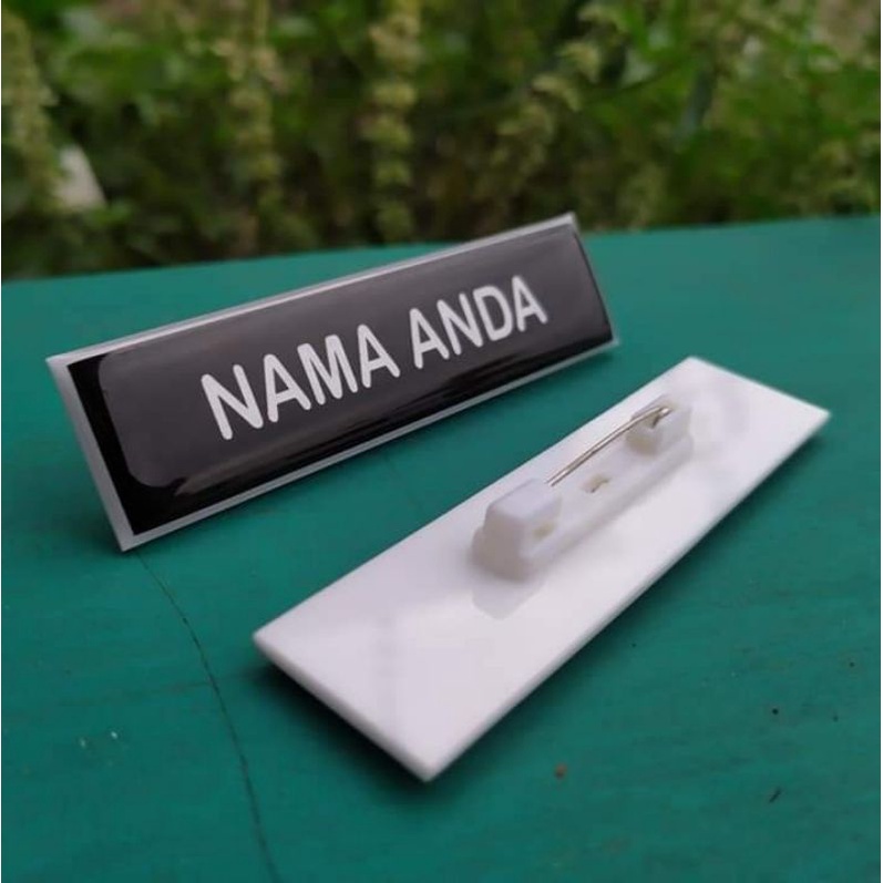

NAME TAGE / NAMA DADA / NAMA SEKOLAH / NAMA KANTOR / NAMA PEGAWAI, NAMA AKRILIK RESIN TIMBUL NAMA DADA PENITI