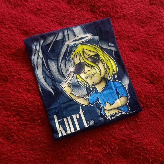 Kaos Band Karikatur Nirvana Kurt Cobain Bootleg Tag Moving Blue Vintage CR. 2003