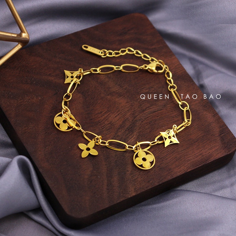 Gelang Rumbai Bunga Clover Bahan Titanium Steel Gaya Korea Untuk Wanita