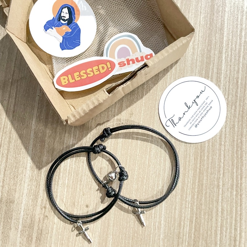 gelang couple salib magnet untuk cari dana