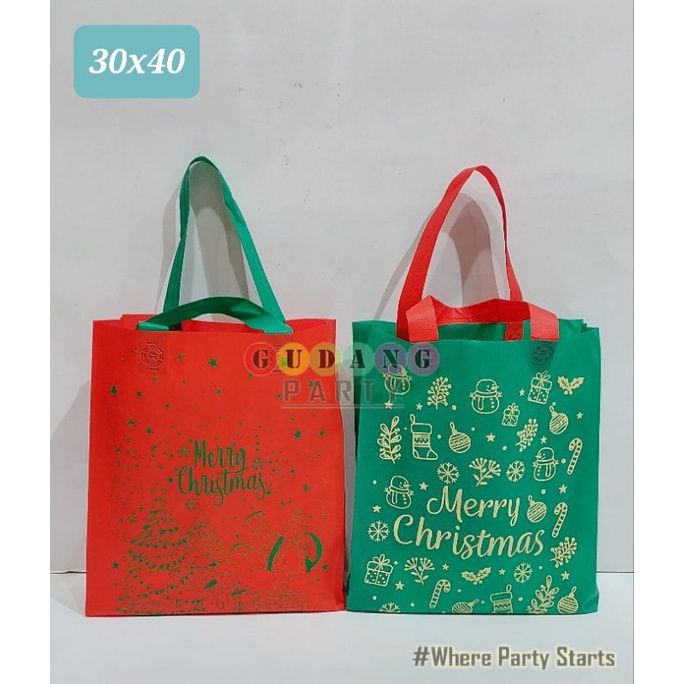 

Spunbond Natal 30x40/Gomico Natal/Tas Bingkisan Natal/Goody Bag Natal/Kantong Natal