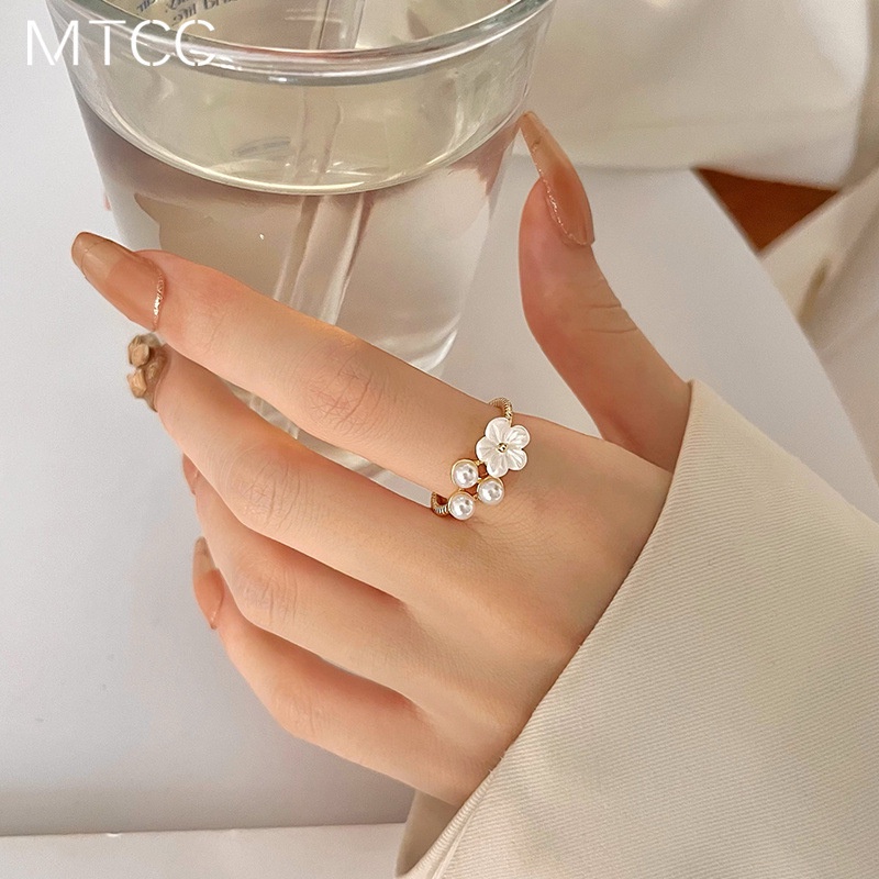 Cincin Model Terbuka Desain Bunga Aksen Mutiara Bahan Zirkon Gaya Korea Untuk Wanita