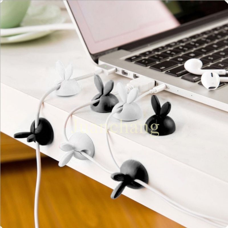 1pc Klip Holder Kabel Earphone Bentuk Telinga Kelinci Bahan Silikon