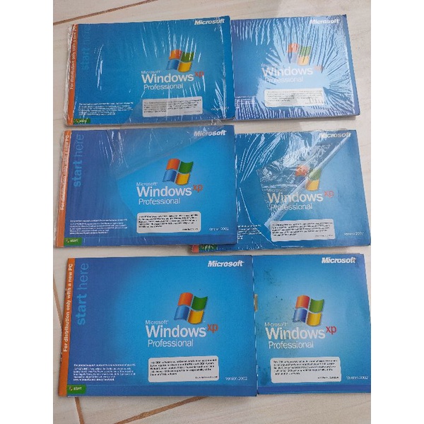 Original CD MS Windows XP SP2 dan SP3