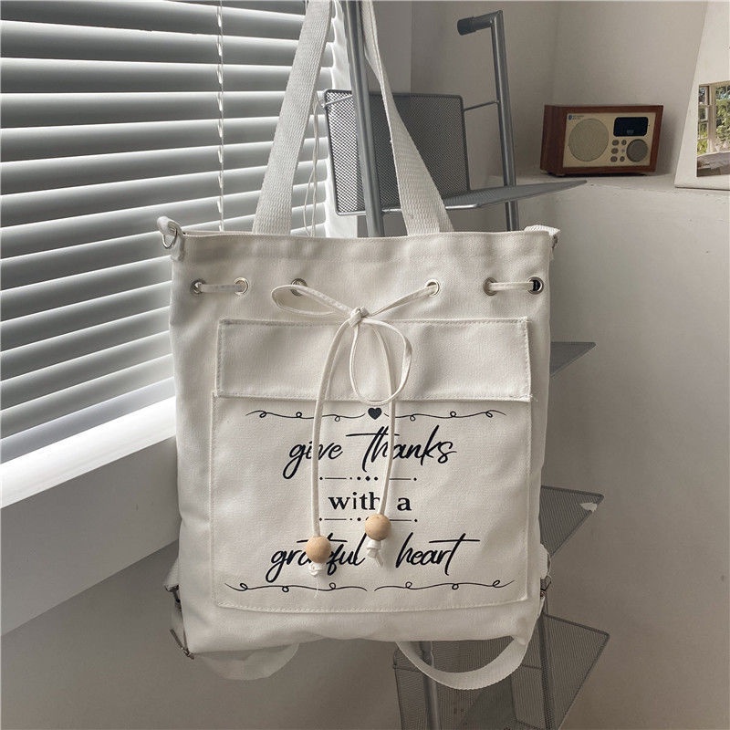 ✌✳Sera 2022 baru tas kanvas siswa perempuan tas bahu satu bahu versi Korea sastra tas messenger sederhana dan serbaguna