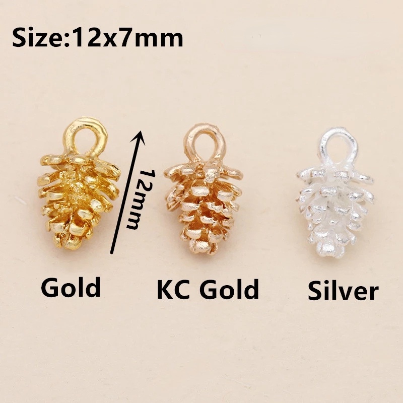 10pcs / Pak Liontin Kalung Bentuk Buah Pinus 3D Bahan Alloy Untuk Dekorasi Natal