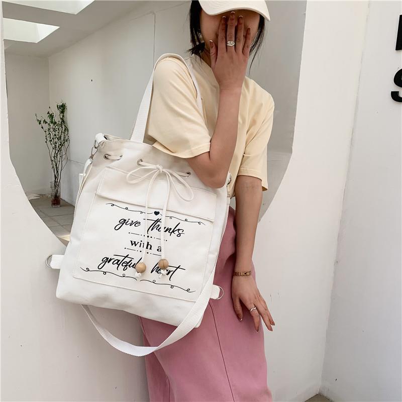 ✌✳Sera 2022 baru tas kanvas siswa perempuan tas bahu satu bahu versi Korea sastra tas messenger sederhana dan serbaguna
