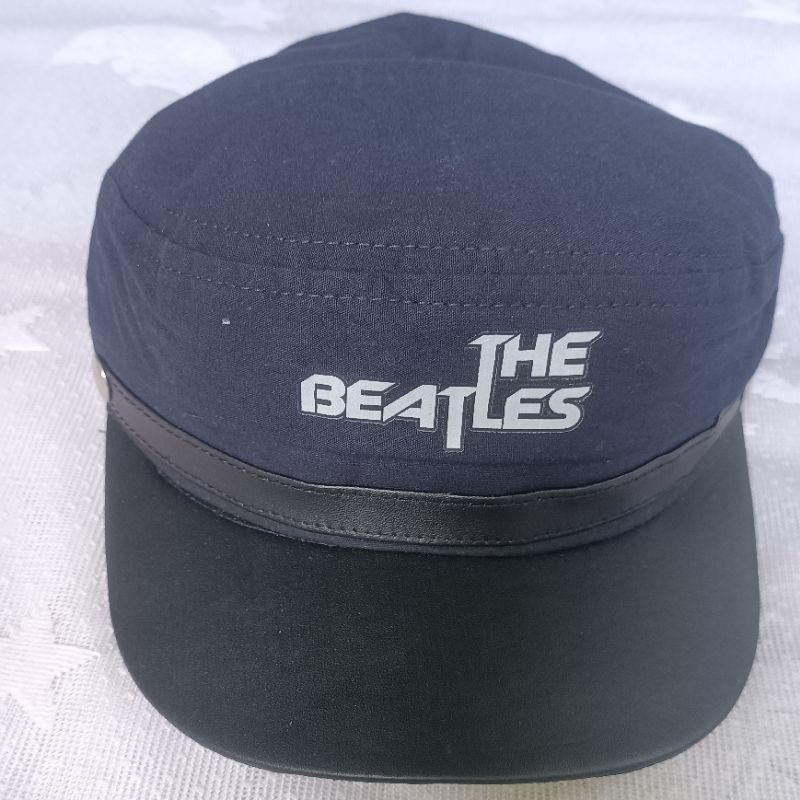 Topi Model commando the beatles