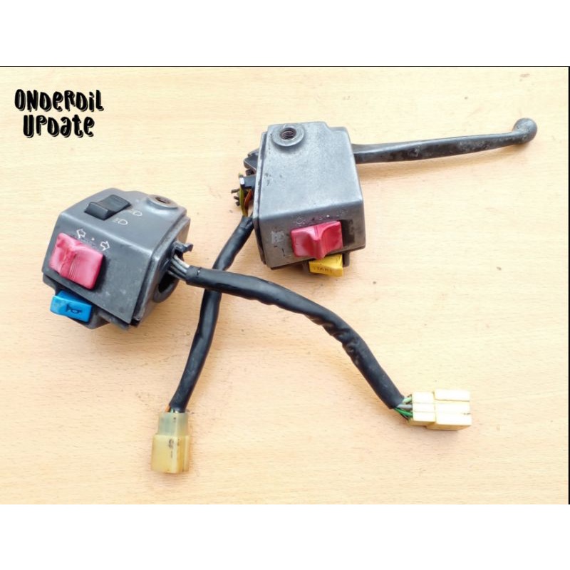 Holder saklar kanan kiri motor Suzuki Rc100 Bravo Crystal Original