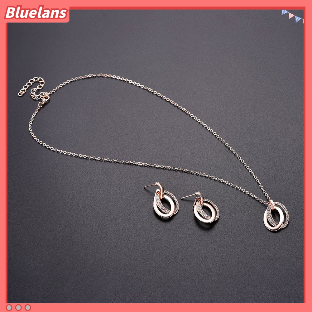 Set Perhiasan Kalung Anting Cincin Oval Ganda Hollow Aksen Berlian Imitasi Untuk Pernikahan