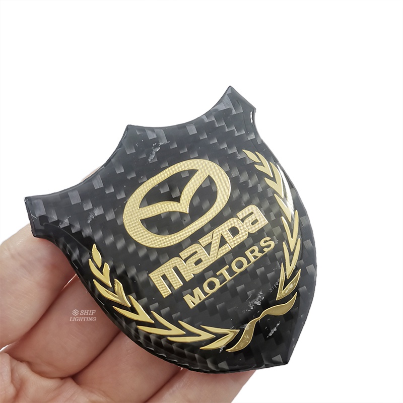 1pc Stiker Emblem Logo MAZDA MOTORS Bahan Karbon Fiber Untuk Dekorasi Jendela Samping Mobil MAZDA