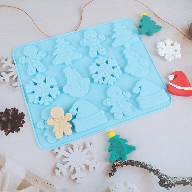 Cetakan Kue Kering Bentuk Snowflake Natal 12 Rongga Bahan Silikon Tahan Suhu Tinggi Untuk Alat Dapur