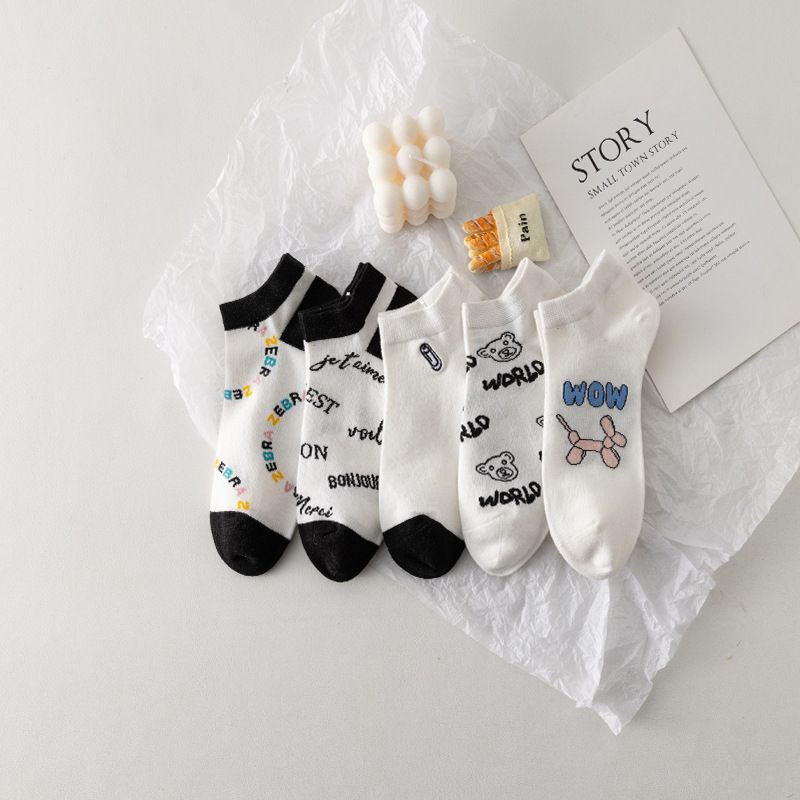kaus kaki motif lucu mata kaki