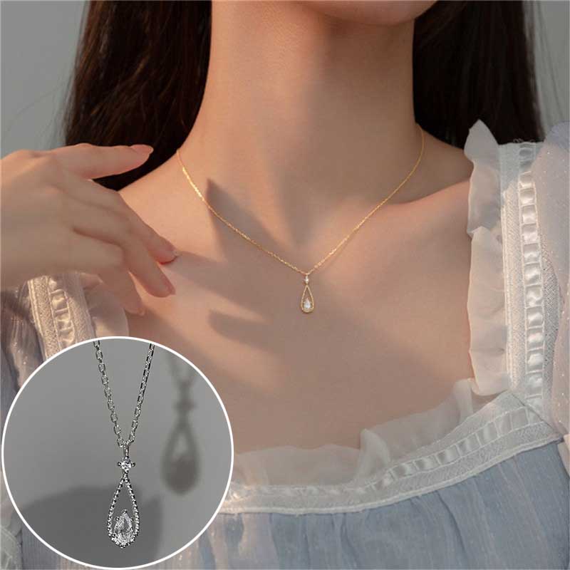 Kalung Rantai Klavikula Liontin Angel Eye Zircon Drop Bahan Titanium Steel Warna Emas Perak Untuk Wanita