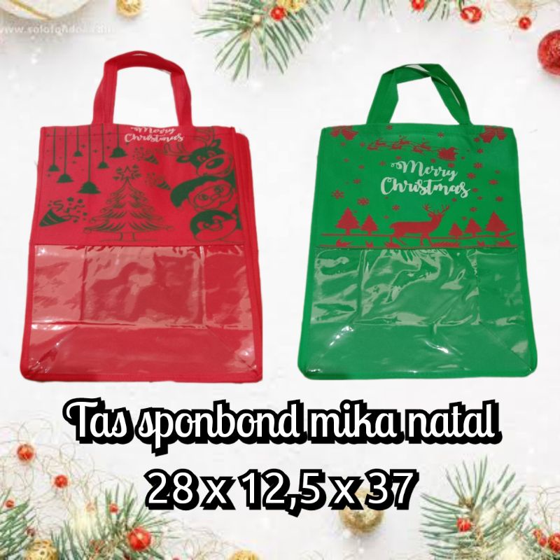 

Tas kain mika motif natal sponbond/spunbond