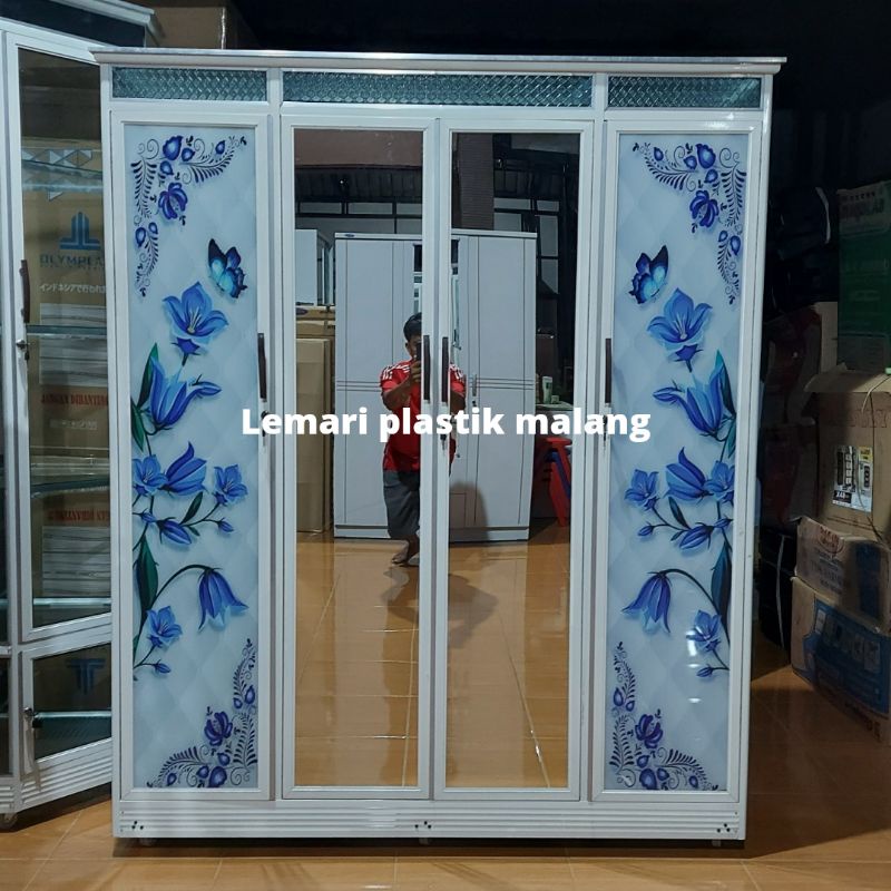 Lemari alumunium kaca 4 pintu motif