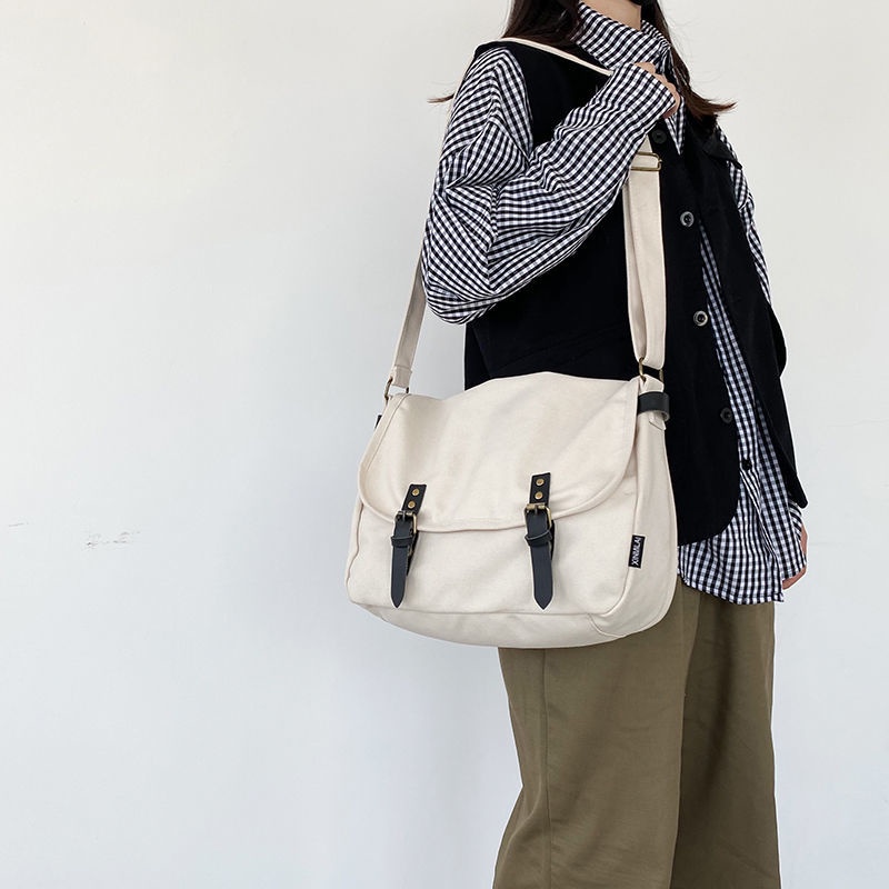 ﺴ✑Jepang In Wild Messenger Bag College Gaya Mahasiswa Tas Kanvas Tas Pria Messenger Tas Wanita Tas Bahu