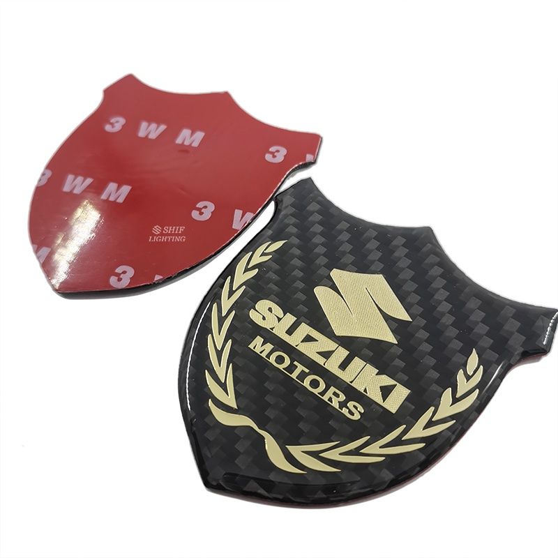 1pc Stiker Emblem Logo SUZUKI MOTORS Bahan Karbon Fiber Untuk Dekorasi Jendela Samping Mobil SUZUKI