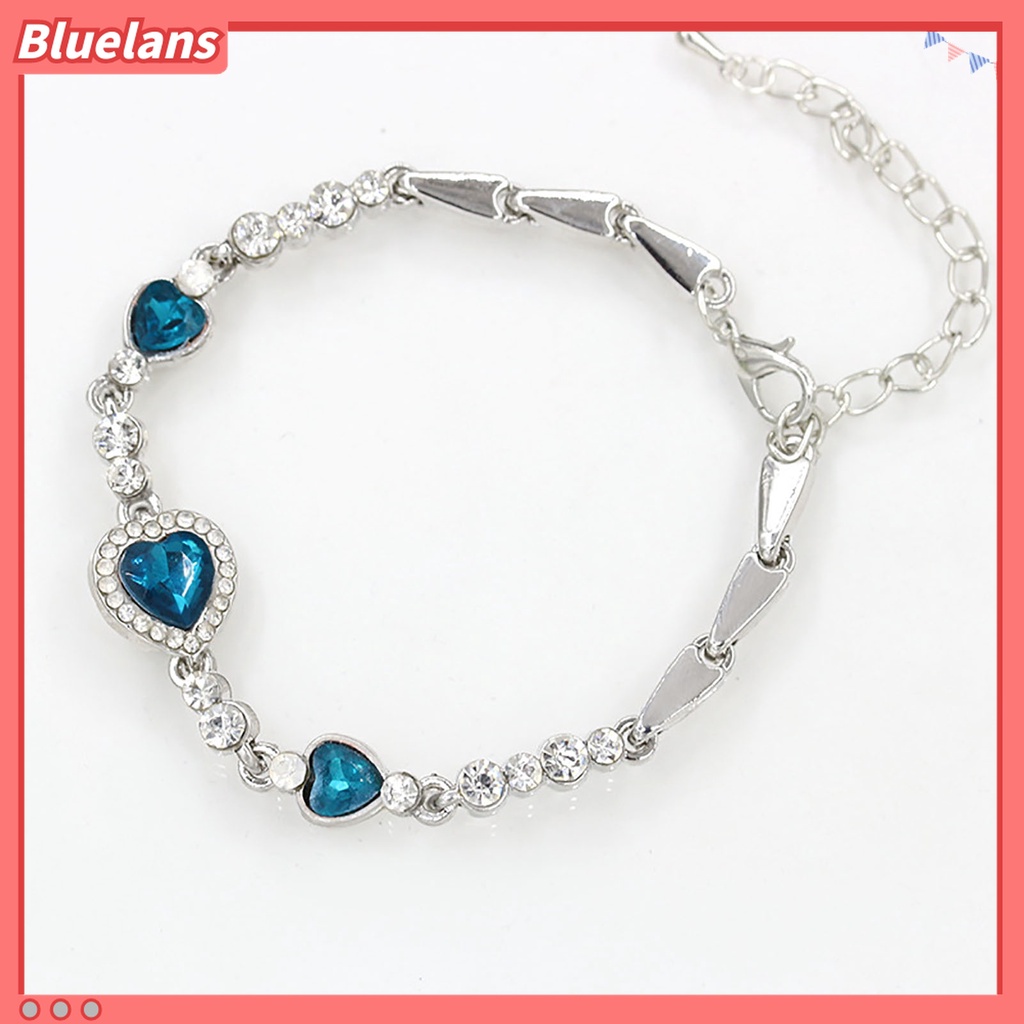 Gelang Rantai Adjustable Bentuk Hati Aksen Berlian Imitasi Warna Biru Bahan Alloy Untuk Wanita