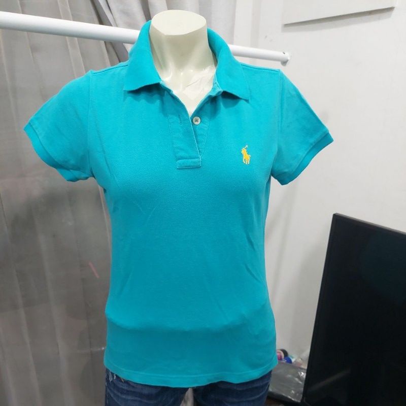Kaos Polo wanita warna biru dongker
