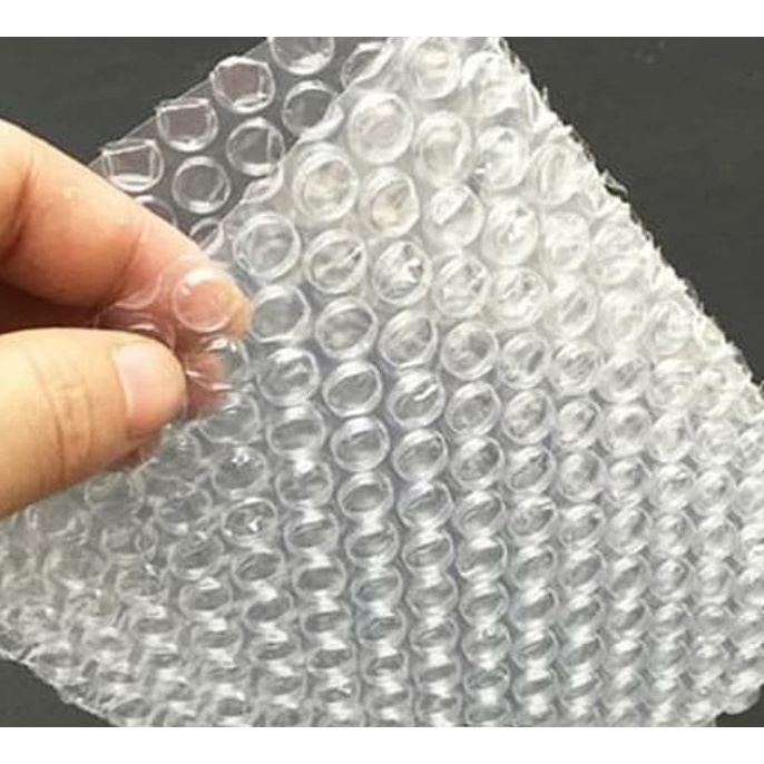 

Packingan Bubble Wrap Hitam dan Putih Untuk Tambahan Biar Aman