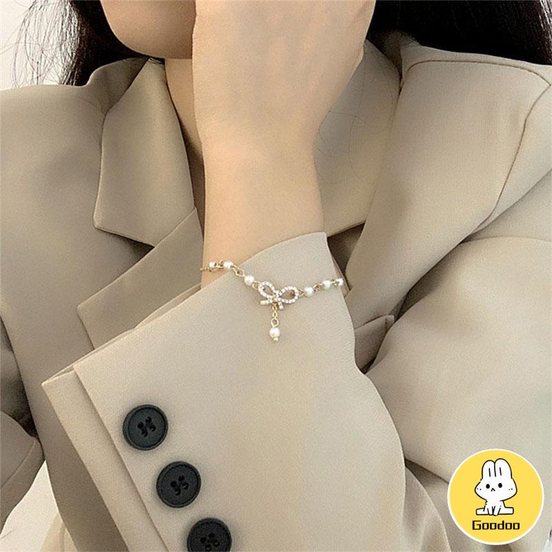 (COD)Gelang Korea Fashion Busur Mutiara Hias Berlian Imitasi Bangle Liar Aksesoris Fashion -Doo
