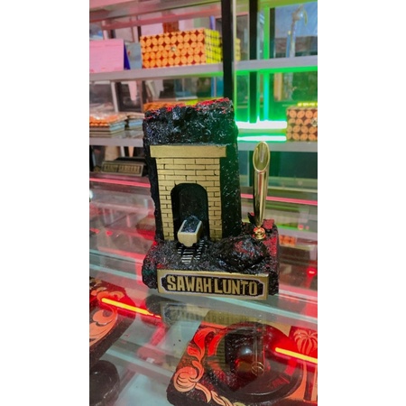hiasan meja tempat pena bahan batu bara