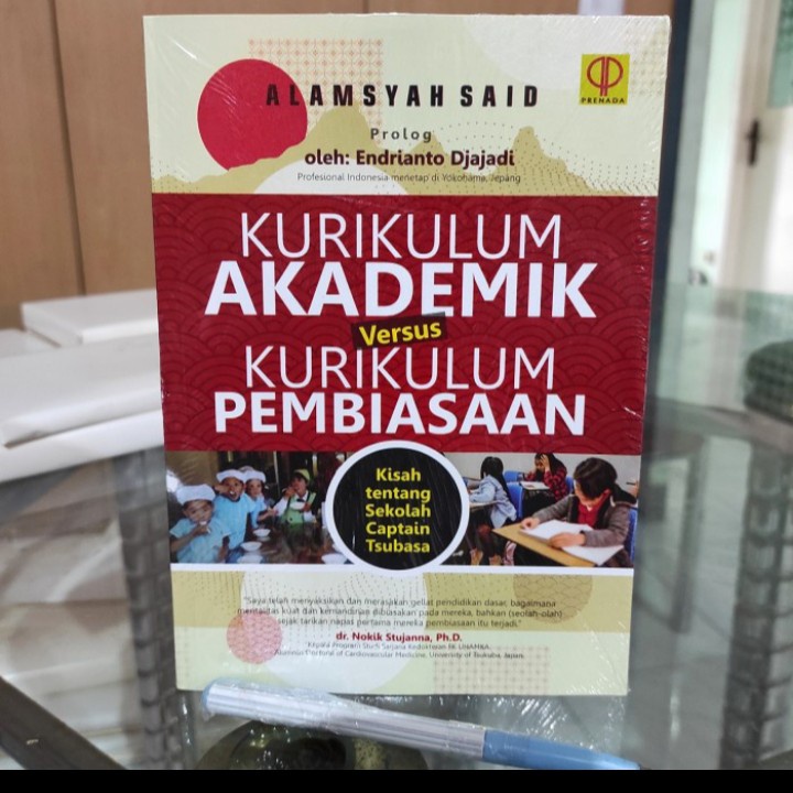 Buku KURIKULUM AKADEMIK VERSUS KURIKULUM PEMBIASAAN KISAH TENTANG SEKOLAH CAPTAIN TSUBASA - ALAMSYAH