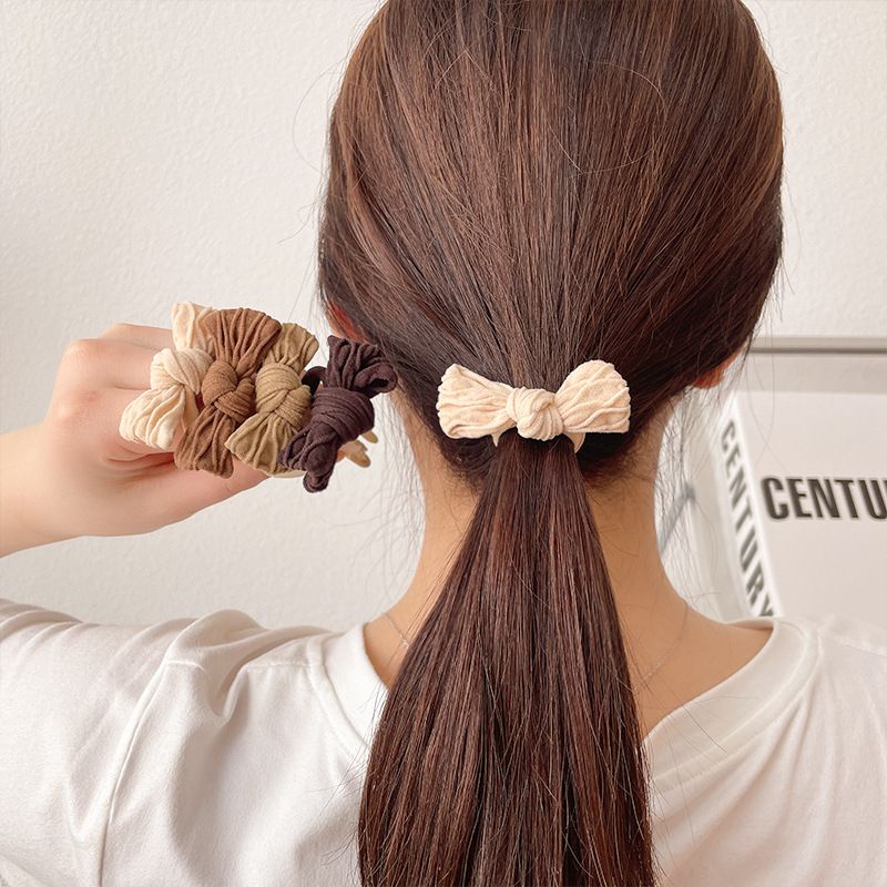 IKAT RAMBUT PITA