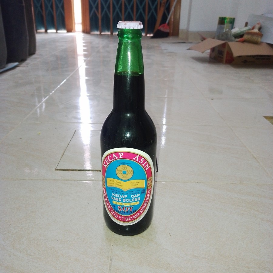 

Kecap Asin cap UANG BOLONG botol kaca - 620 ml