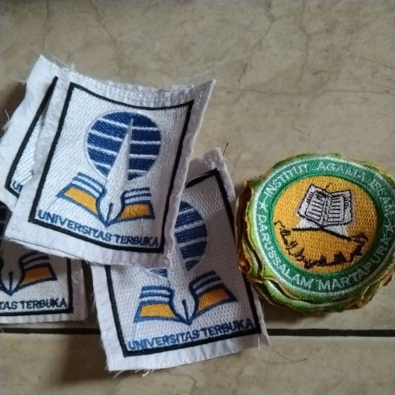 logo universitas bordir